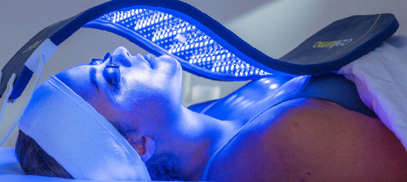 Woman using Celluma device