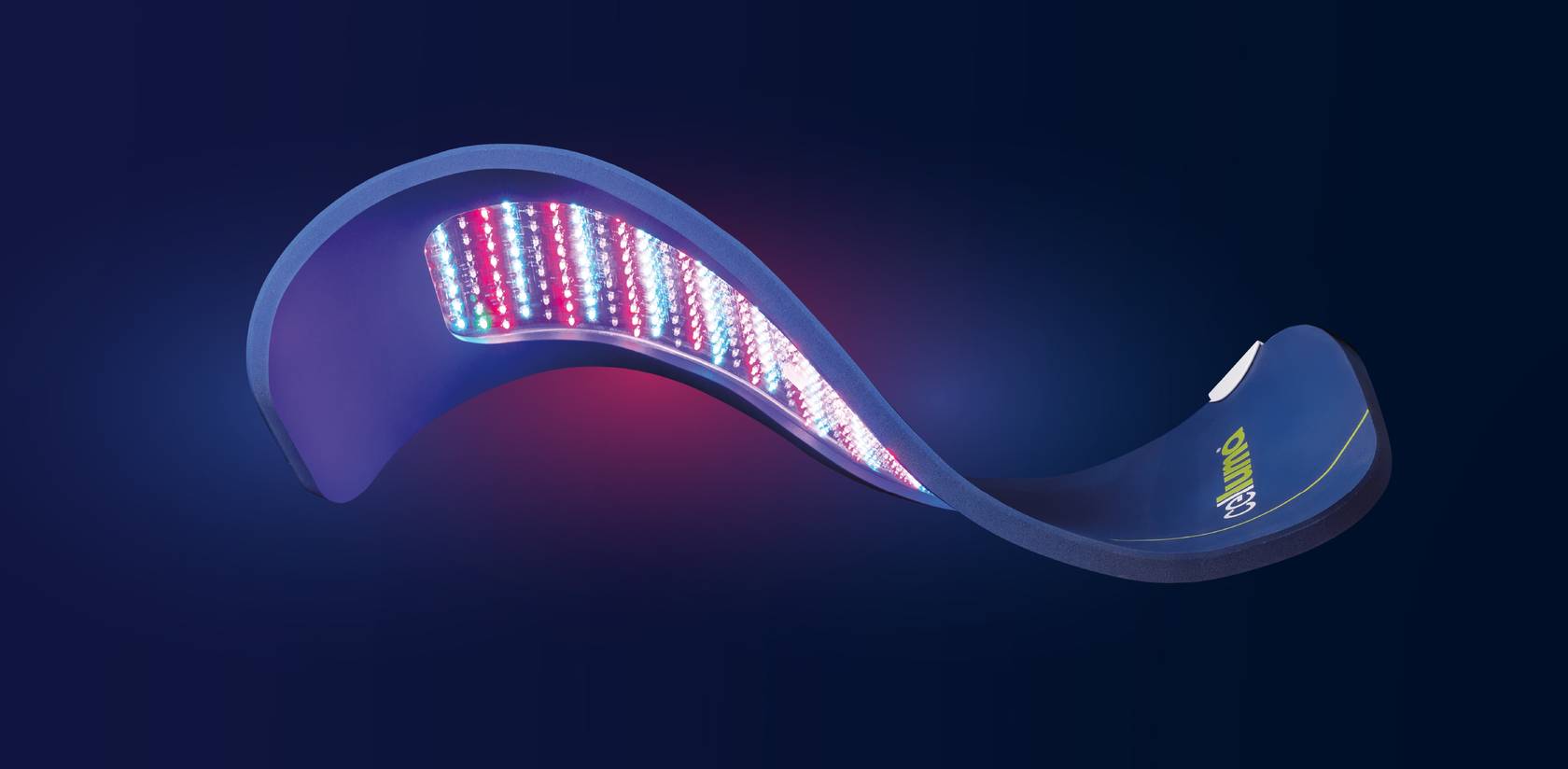 Image of a floating Celluma PRO LED light therapy panel on a dark background, showing the underside lit with red light, blue light, and near-infrared light.