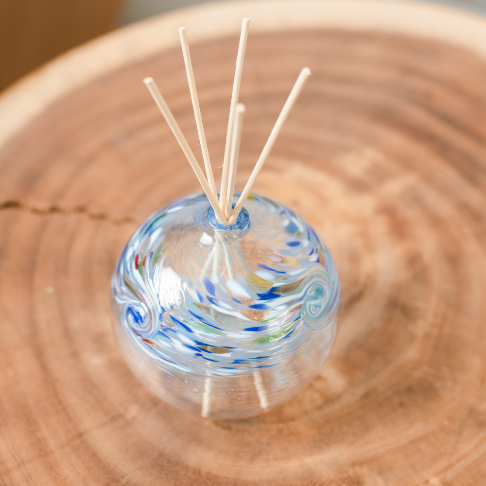 Water diffuser on a wooden table.