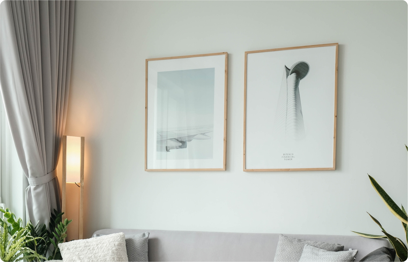 Two Framed Pictures on Wall