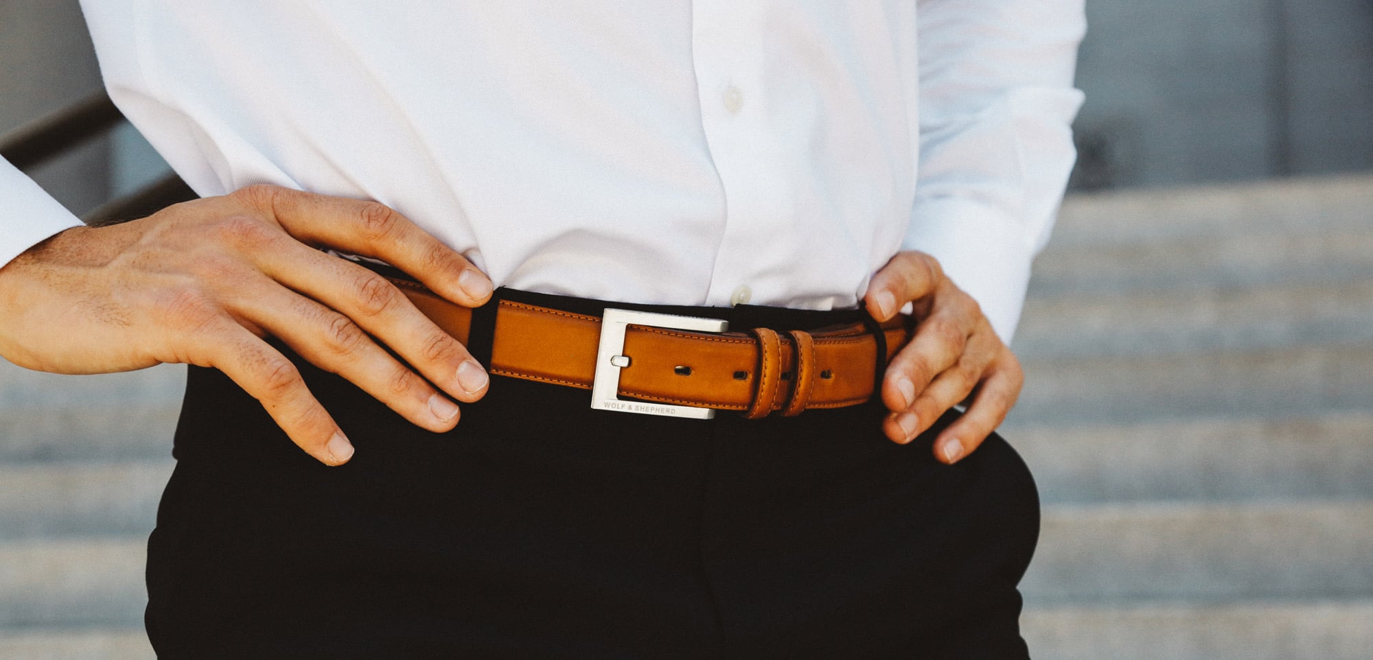 Waist view of man wearing Sealth Belt in Honey with hands on his waist