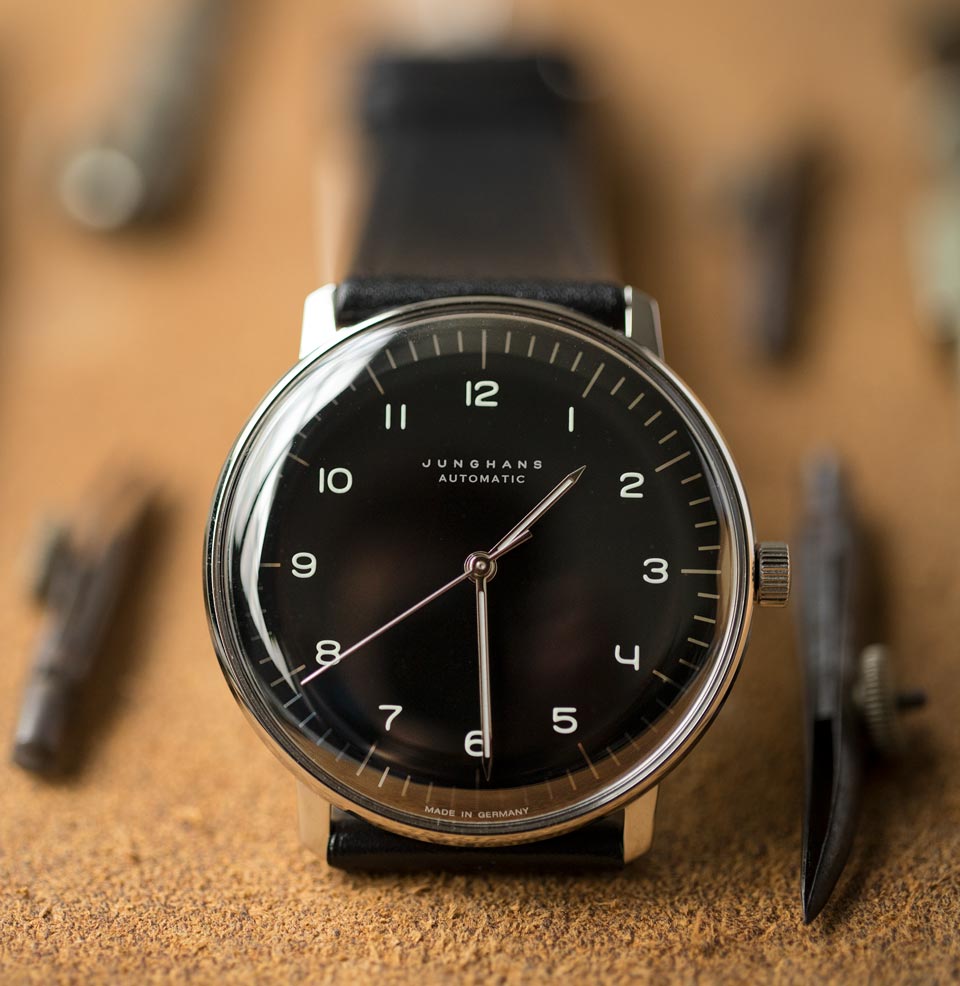 Max Bill Automatic  Black dial with lume numerals and polished index