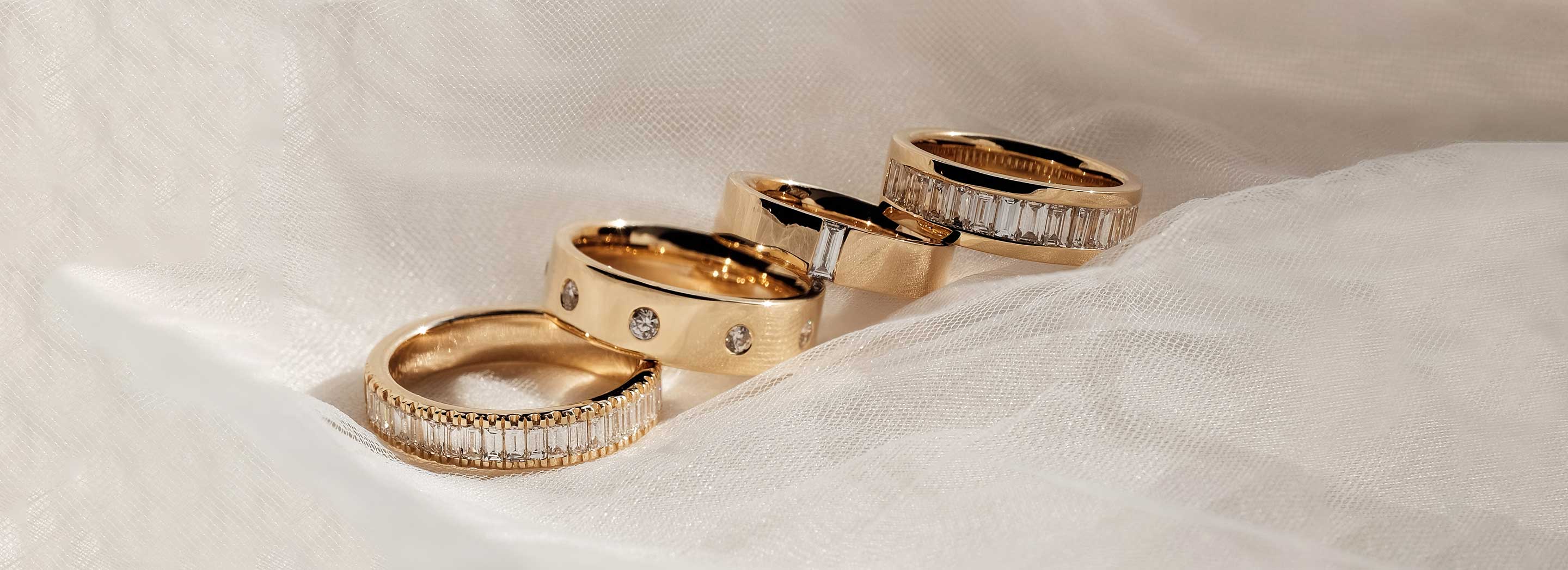 Sold at Auction: Pair of 18ct gold and diamond 'Empreinte' rings