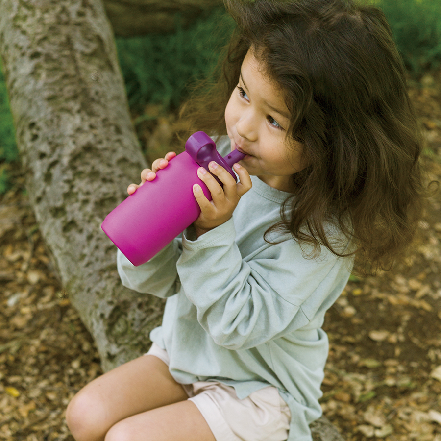  Little girl drinking out of the purple PLAY tumbler  