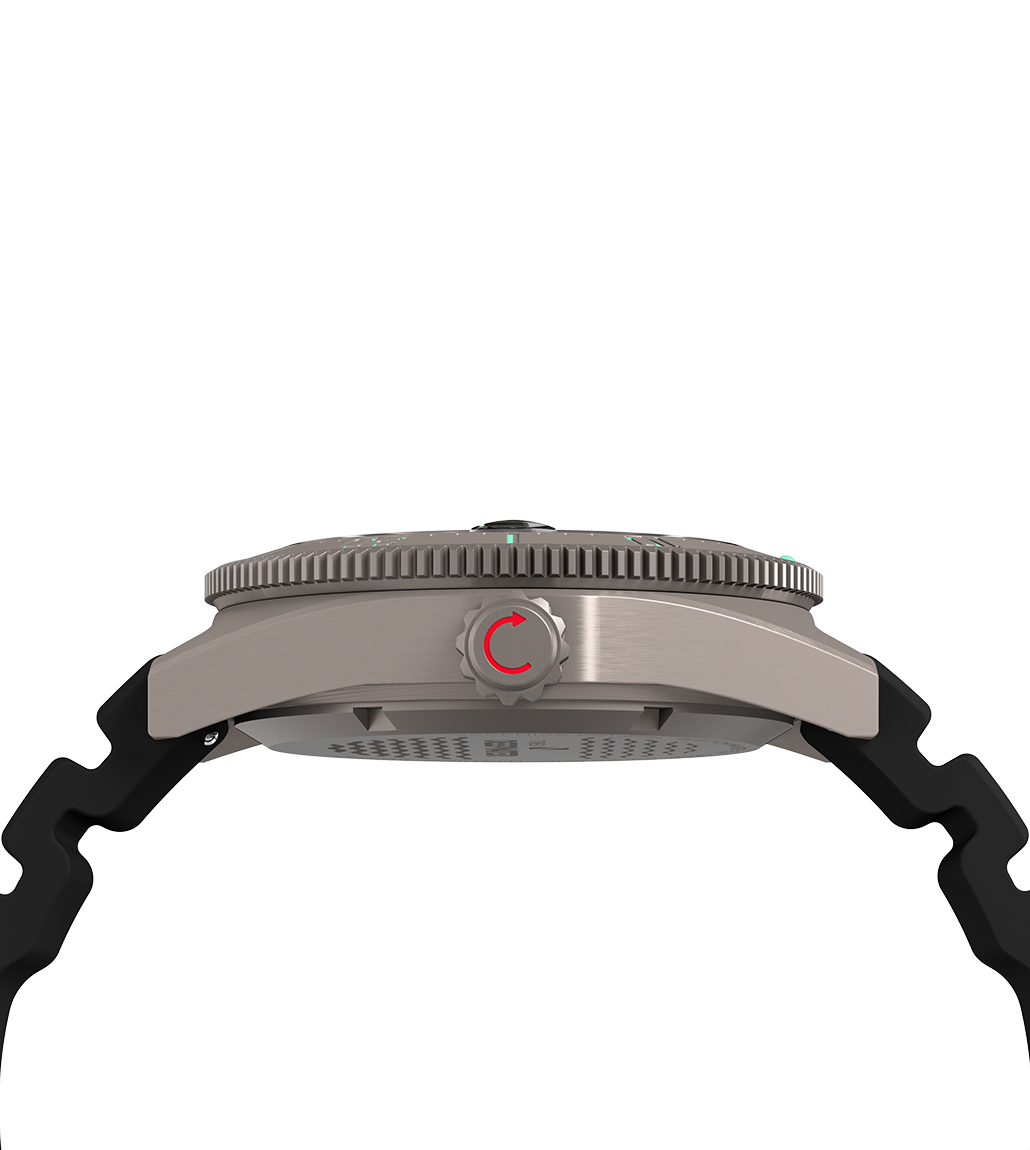 Side profile of the Timex Deepwater Titanium Automatic watch. The brushed titanium case and screw-down crown are visible, with a red arrow on the crown indicating rotation direction, emphasizing water resistance and build quality.