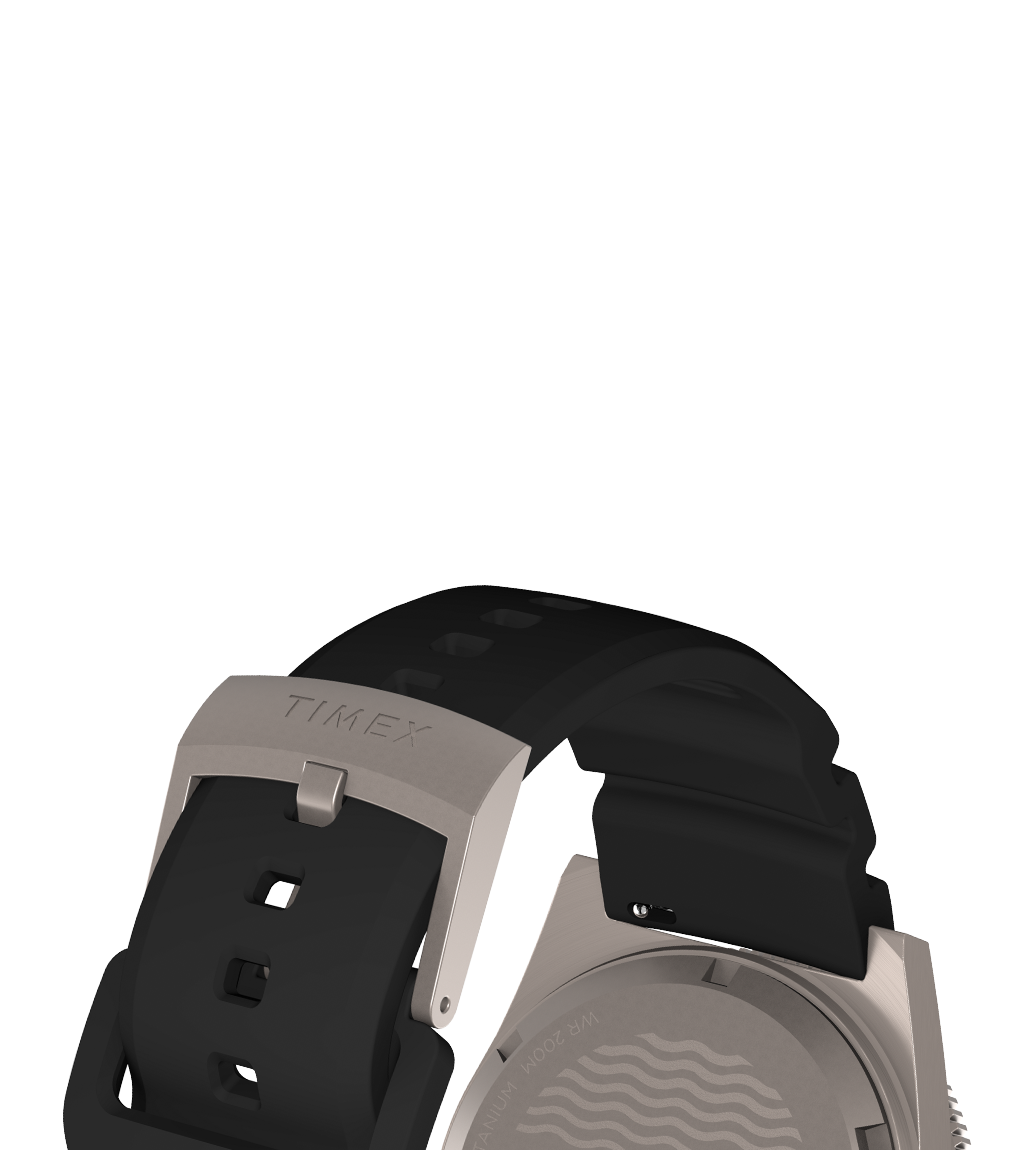 Close-up view of the watch's strap and buckle. The textured black silicone strap features the TIMEX branding on the titanium buckle, with a partial view of the engraved wave pattern on the case back, reinforcing its marine design inspiration.