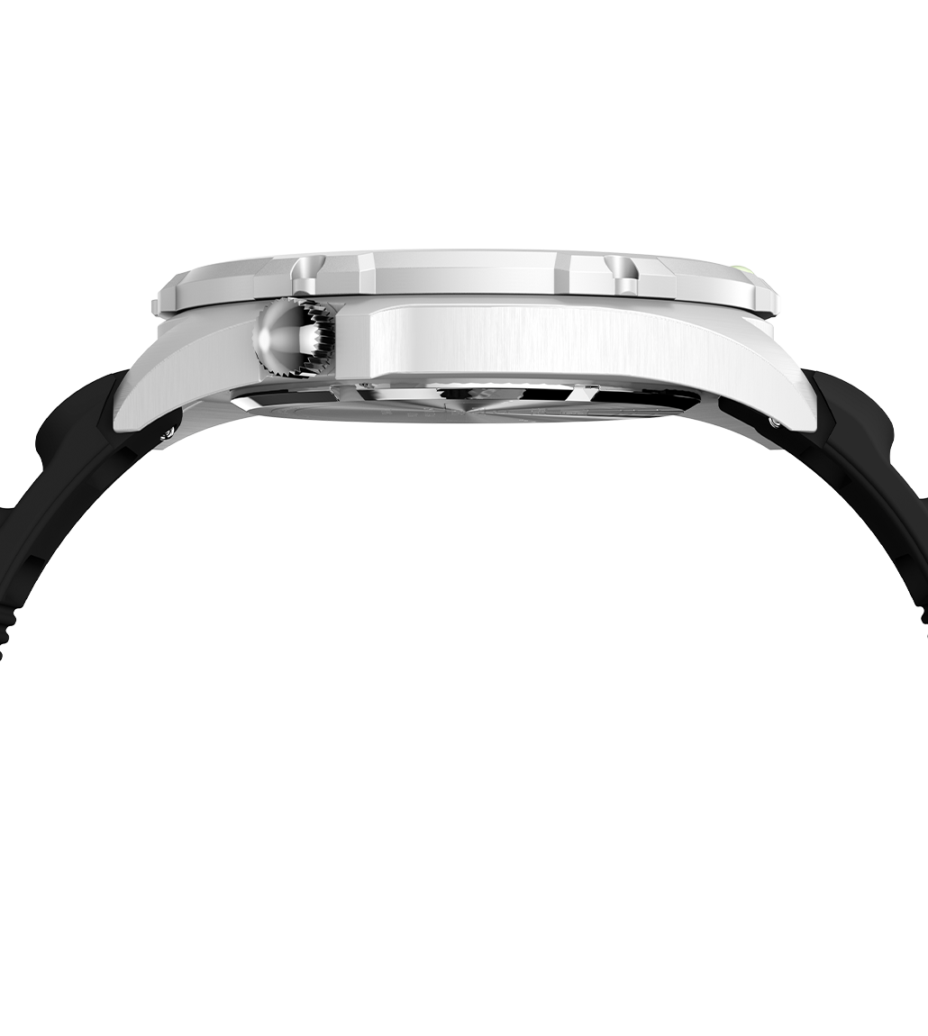 A sleek side profile of the Timex 1995 Intrepid Reissue watch, showcasing the brushed stainless steel case, slightly raised black bezel, and polished crown. The watch's robust construction and curved black rubber strap are visible, highlighting its durable and sporty design.