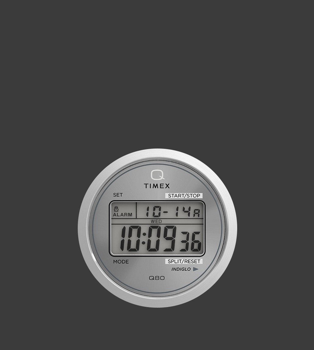 Isolated watch face render of the Q80 Continental, focusing on its minimal, circular digital display with clear INDIGLO® and mode markings.