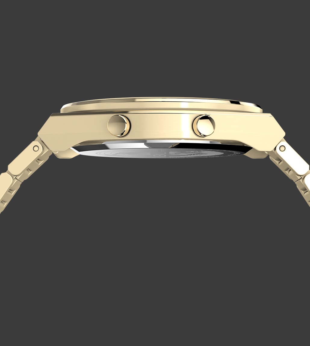 Side profile of the Q Timex® Q80 Continental watch showcasing its slim, polished gold-tone stainless steel case and integrated bracelet with two control buttons on the right side.
