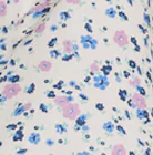 Ivory ditsy print twist front blouse