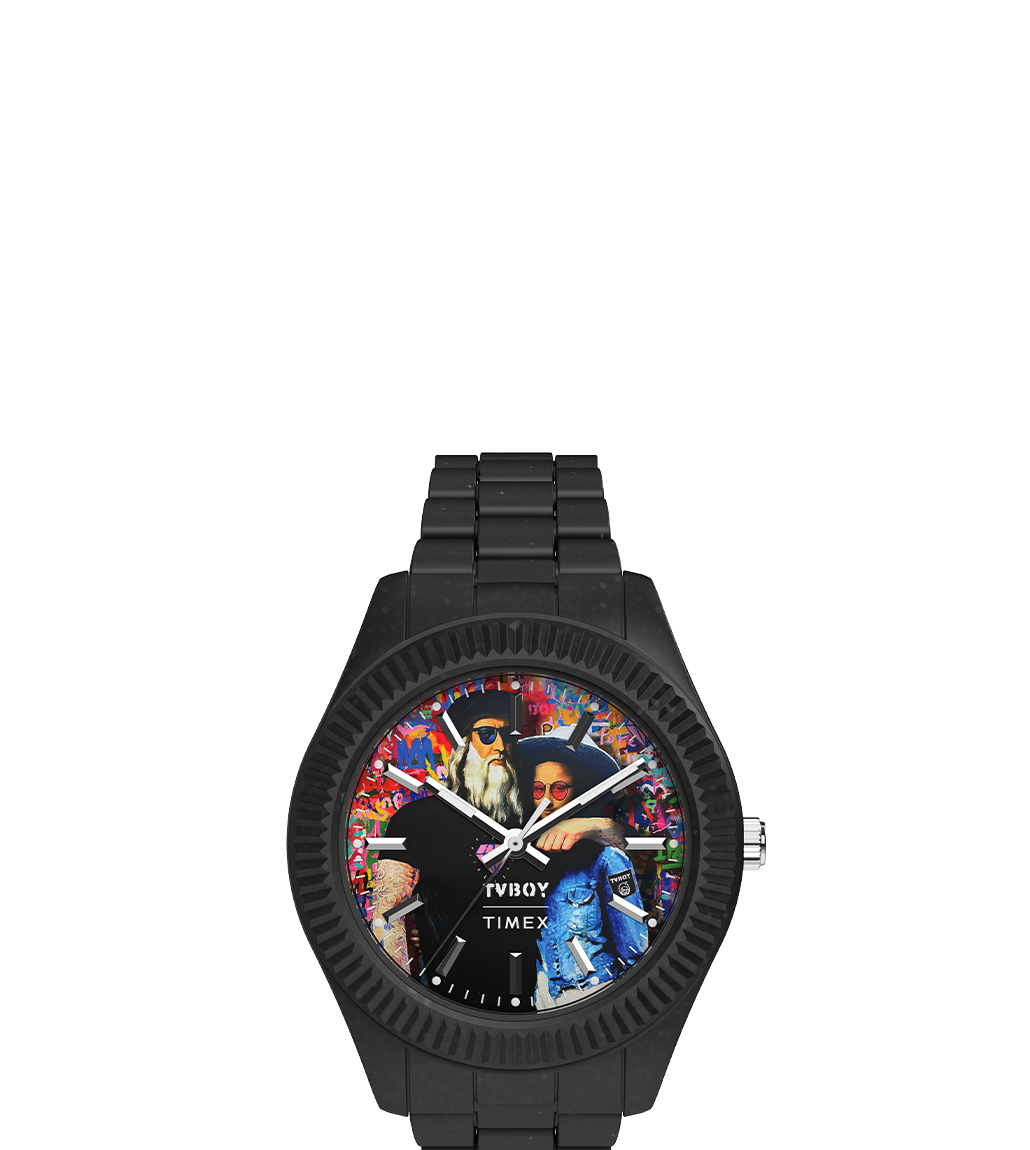 Front-facing Timex Legacy Ocean x TVBOY analog watch with a matte black case and matching black bracelet. The colorful dial features TVBOY’s street art depiction of Leonardo da Vinci and Mona Lisa wearing modern clothes and sunglasses, against a vibrant graffiti-style background. White hour and minute hands, a sweep second hand, and a date window are visible. Branding includes 'TVBOY' and 'TIMEX' logos on the dial.