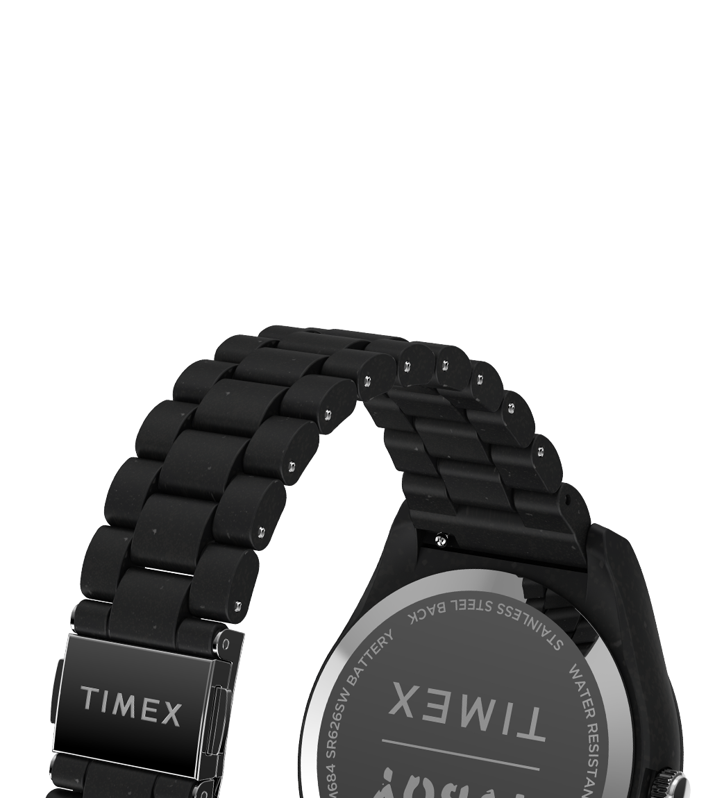 Rear view of the Timex Legacy Ocean x TVBOY watch highlighting the black stainless steel link bracelet with a deployment clasp engraved with 'TIMEX'. The caseback displays etched branding details including 'TIMEX', 'STAINLESS STEEL BACK', 'WATER RESISTANT', and 'TVBOY'.