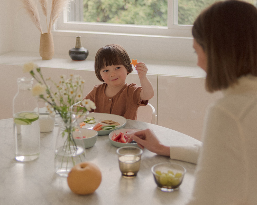  Toddler holding a cheese 