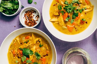 Bowls of curry made with Navitas Turmeric Powder