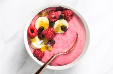 Smoothie bowl made with Navitas Pomegranate Powder and fresh fruit