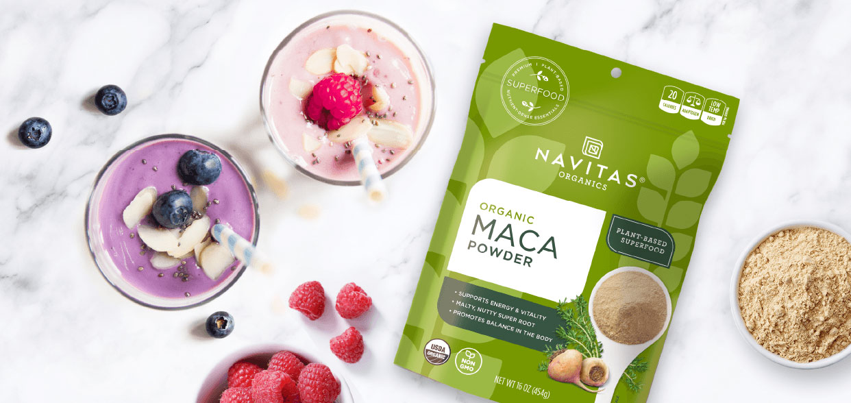 Package of Navitas Maca Powder next to smoothies made with Navitas Maca Powder 