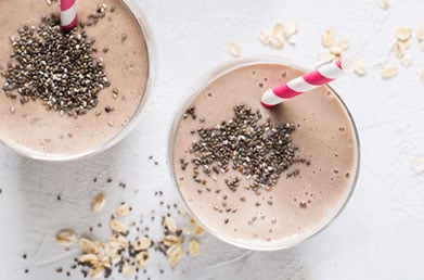 Smoothies in glasses topped with Navitas Chia Seeds