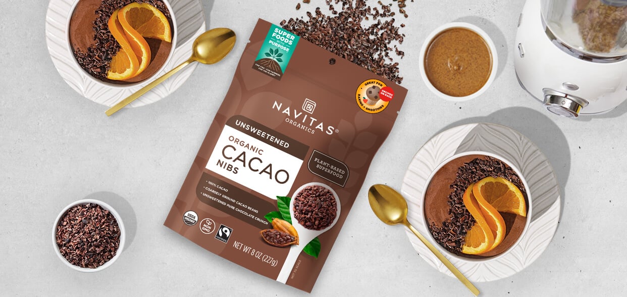 A bag of Navitas Organics unsweetened Cacao Nibs with chocolate tarts