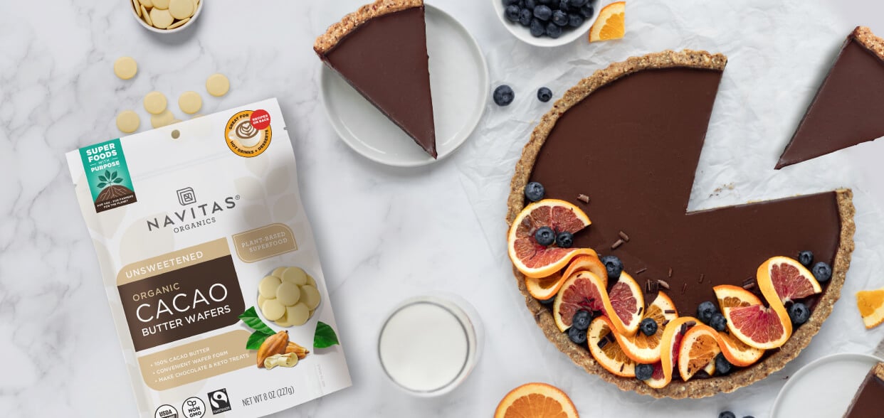Navitas Organics Cacao Butter Wafers with a chocolate orange tart