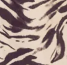 Brown zebra print barrel leg jeans