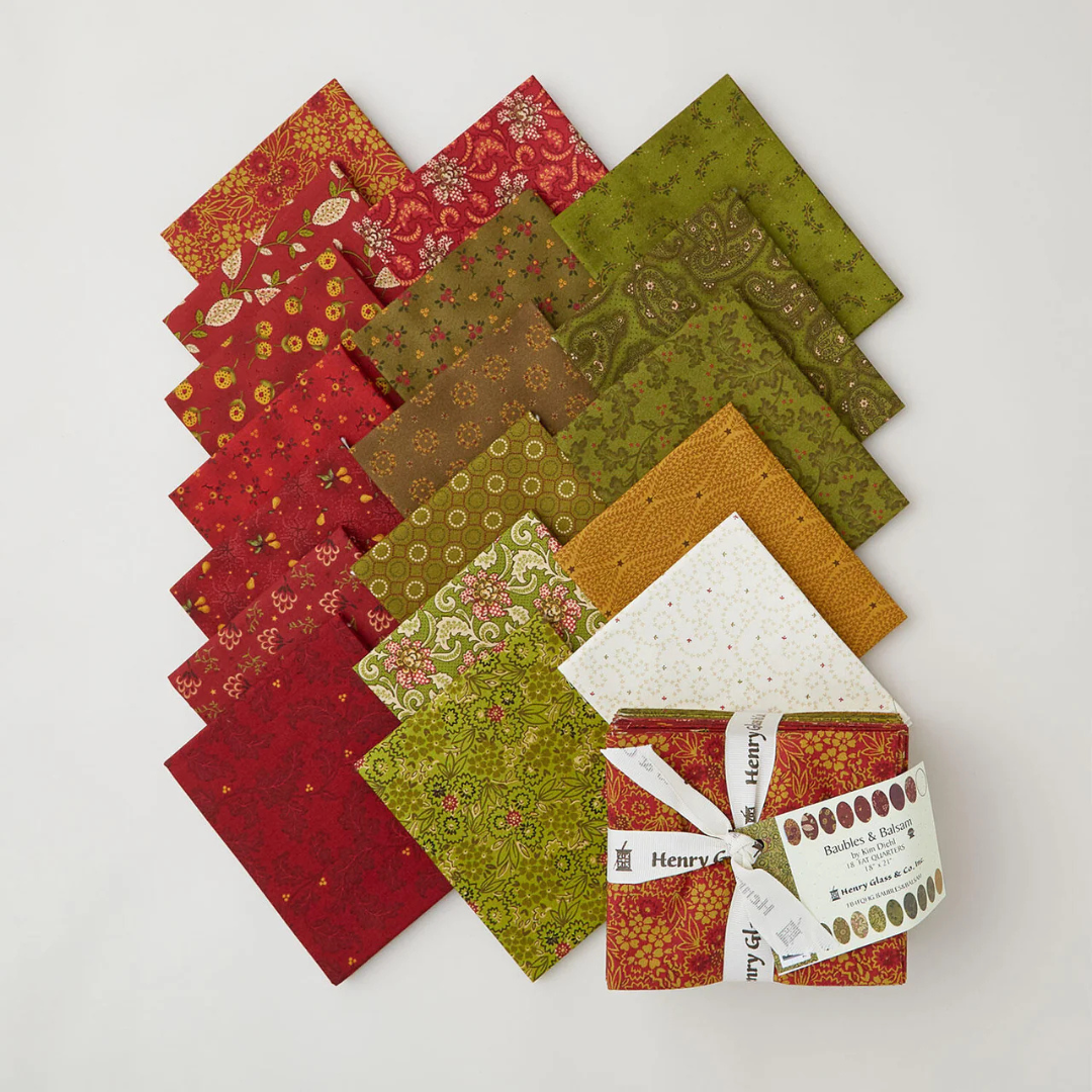 a selection of fat quarter fabrics designed by Kim Diehl for Henry Glass Fabrics.