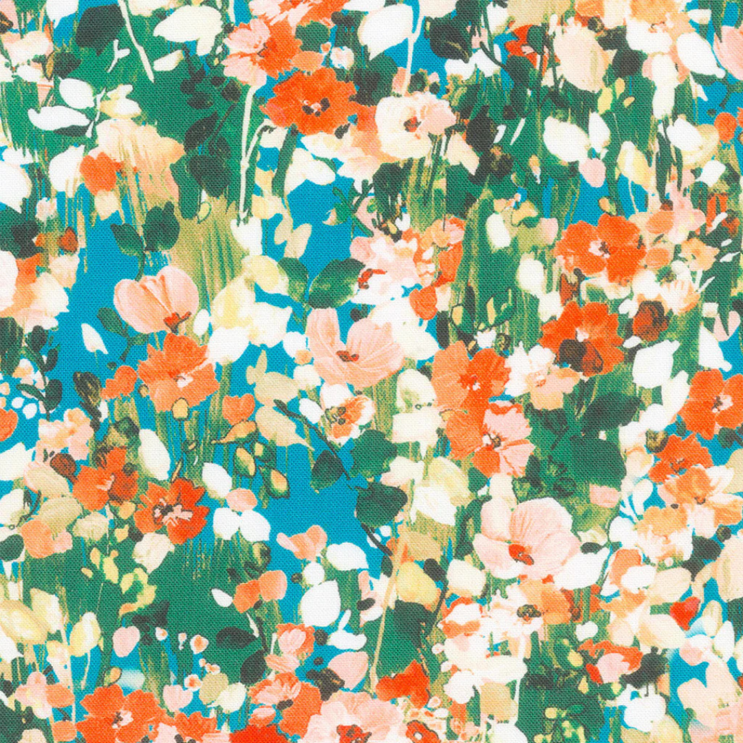 a colorful floral fabric print in blue, orange, peach, yellow, white and green from the Painterly Petals fabric collection from Robert Kaufman.