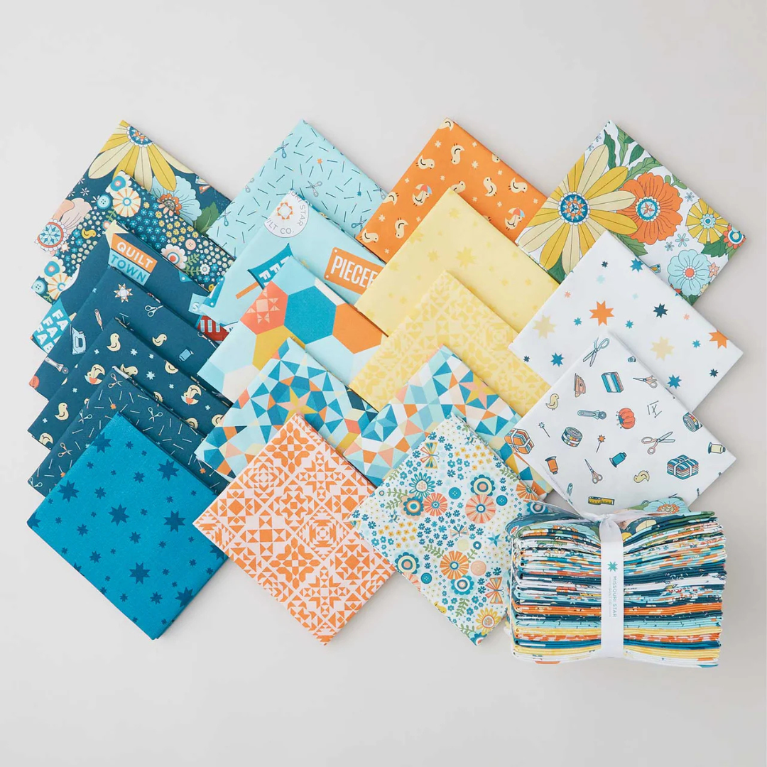 a selection of fat quarter prints from the Missouri Star souvenir fabric collection.