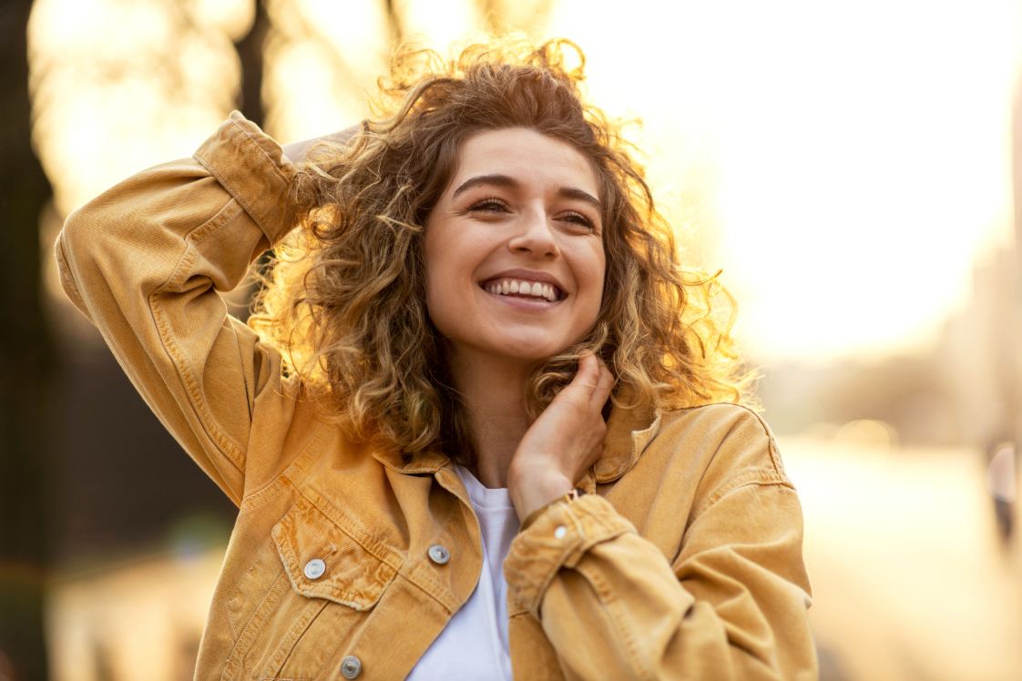 Person outdoors in warm natural light