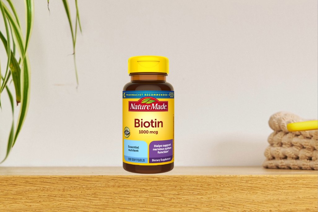 Nature Made Biotin 1000 mcg supplement bottle on a table