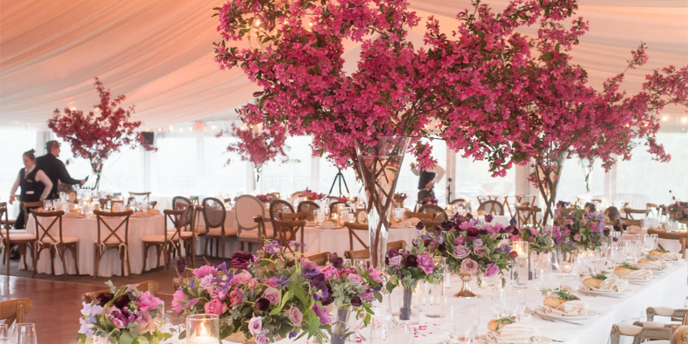 wedding floral stands with red plants