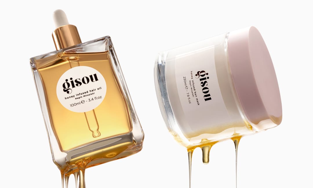 Honey Infused Hair Oil, Hair Mask, floating in air with honey dripping