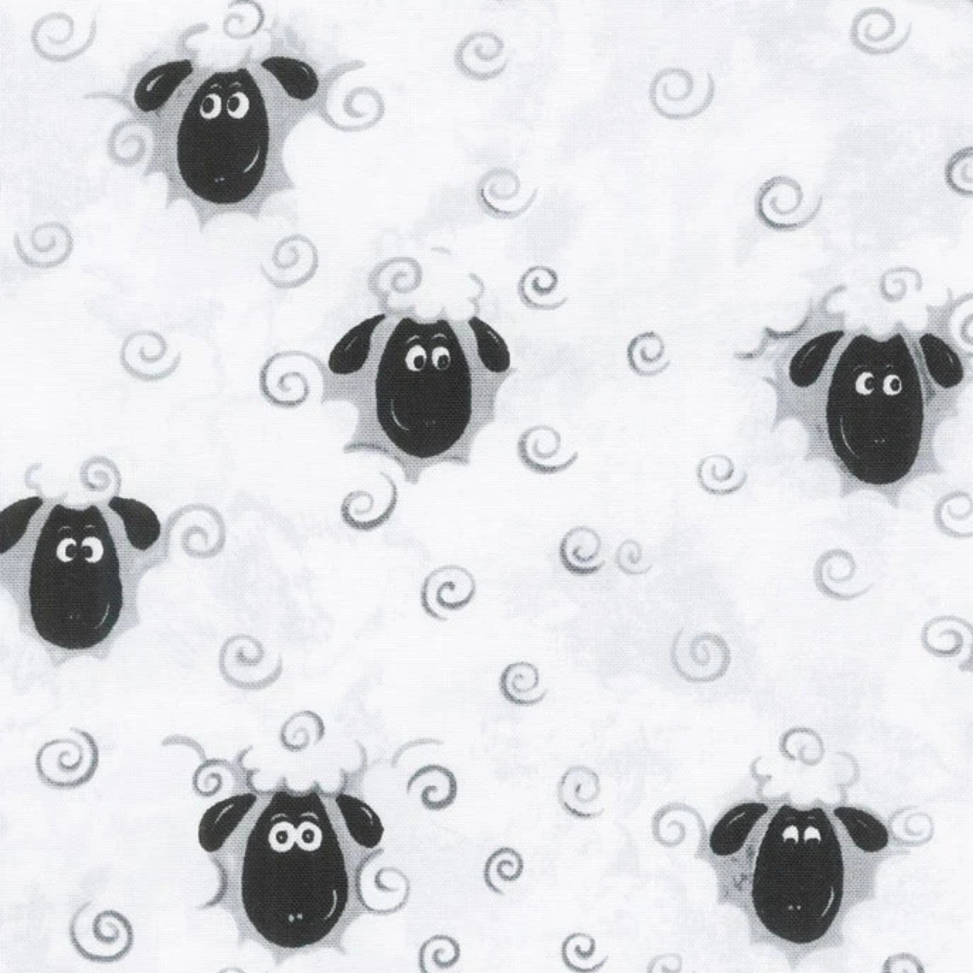 a black and white sheep fabric print.