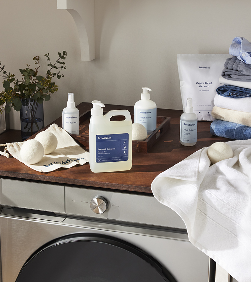 Brooklinen Laundry Care Collection on a Washer and Dryer