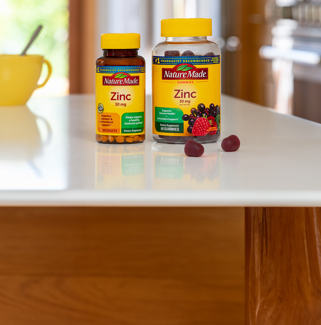 Nature Made® Zinc Tablets and Zinc Gummies on a counter