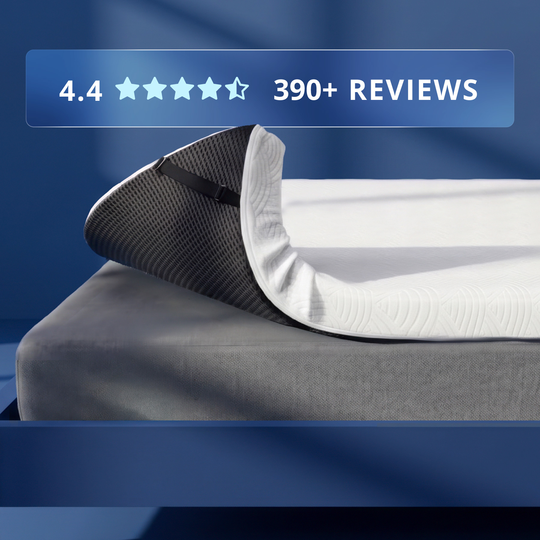 Orders placed by 2pm ships same day. 4" Copper Infused Foam. Made in the USA. Photo of a 4" thick white mattress topper secured to a bed with adjustable straps.