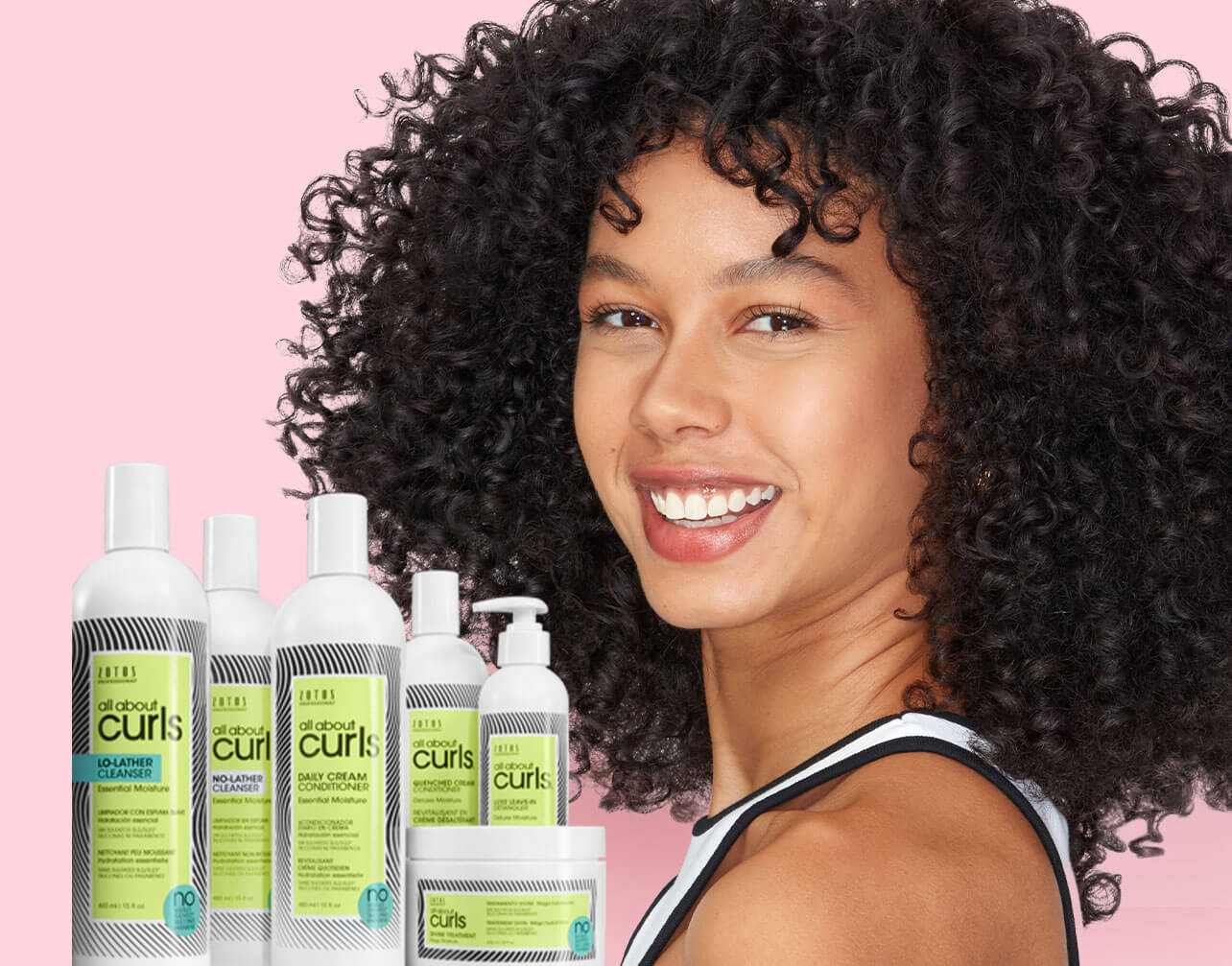 Curly hair model with products on pink background