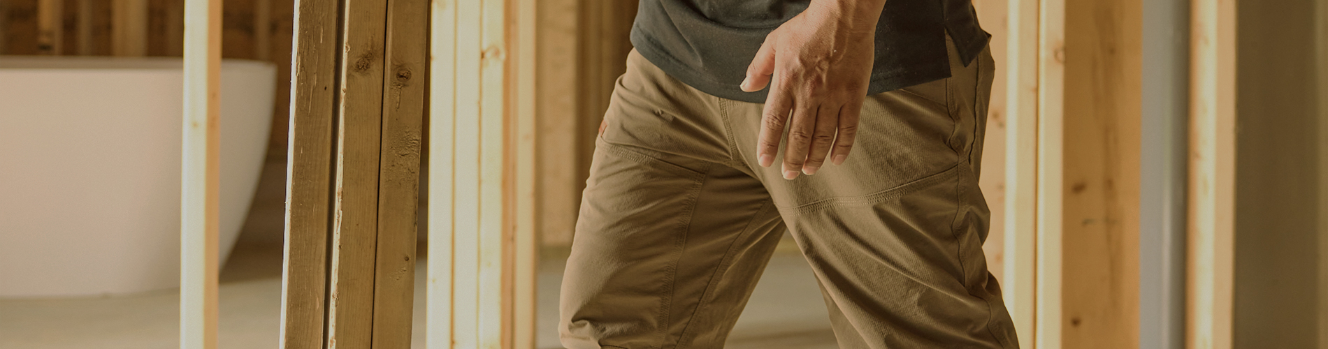 Man wearing BRUNT Water Resistant Double-Knee Martin Utility Work Pant in Brown