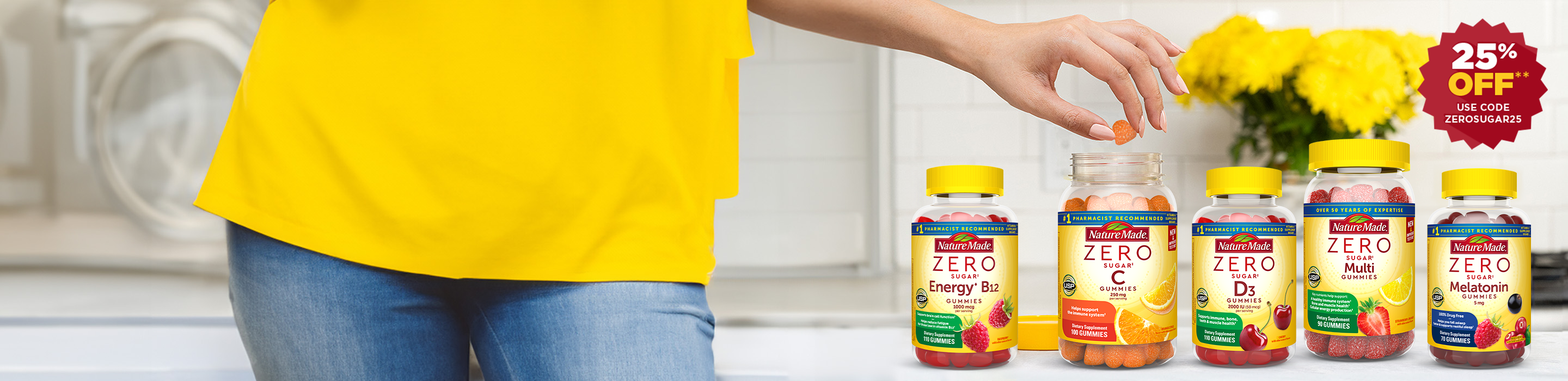 Person in a yellow top reaching for a gummy from an open bottle of Nature Made Zero Sugar vitamins on a kitchen counter. Red burst with text that reads 25% off use code ZEROSUGAR25