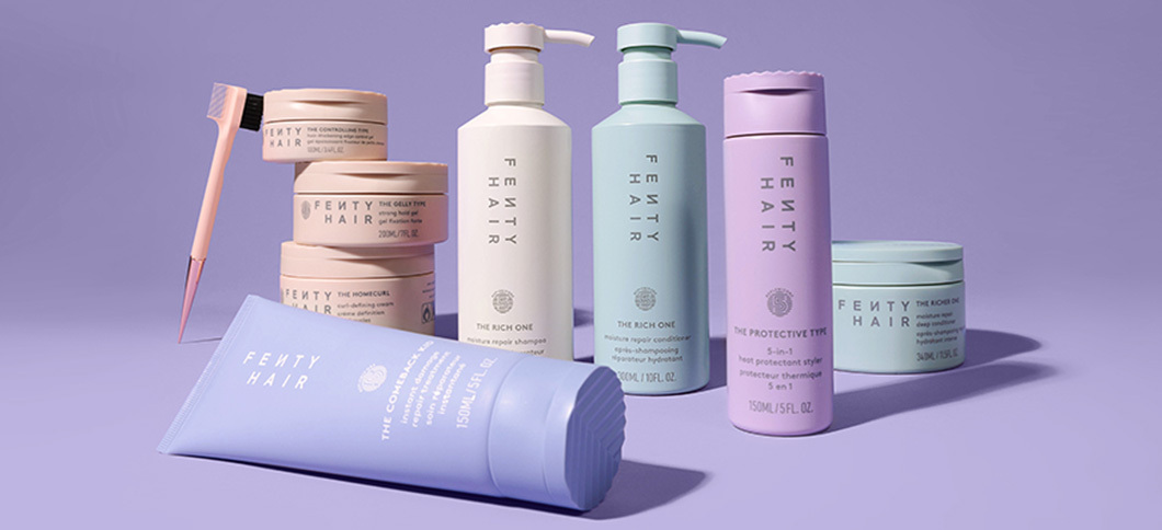 Product shot of Fenty Hair product line on a lavender background.