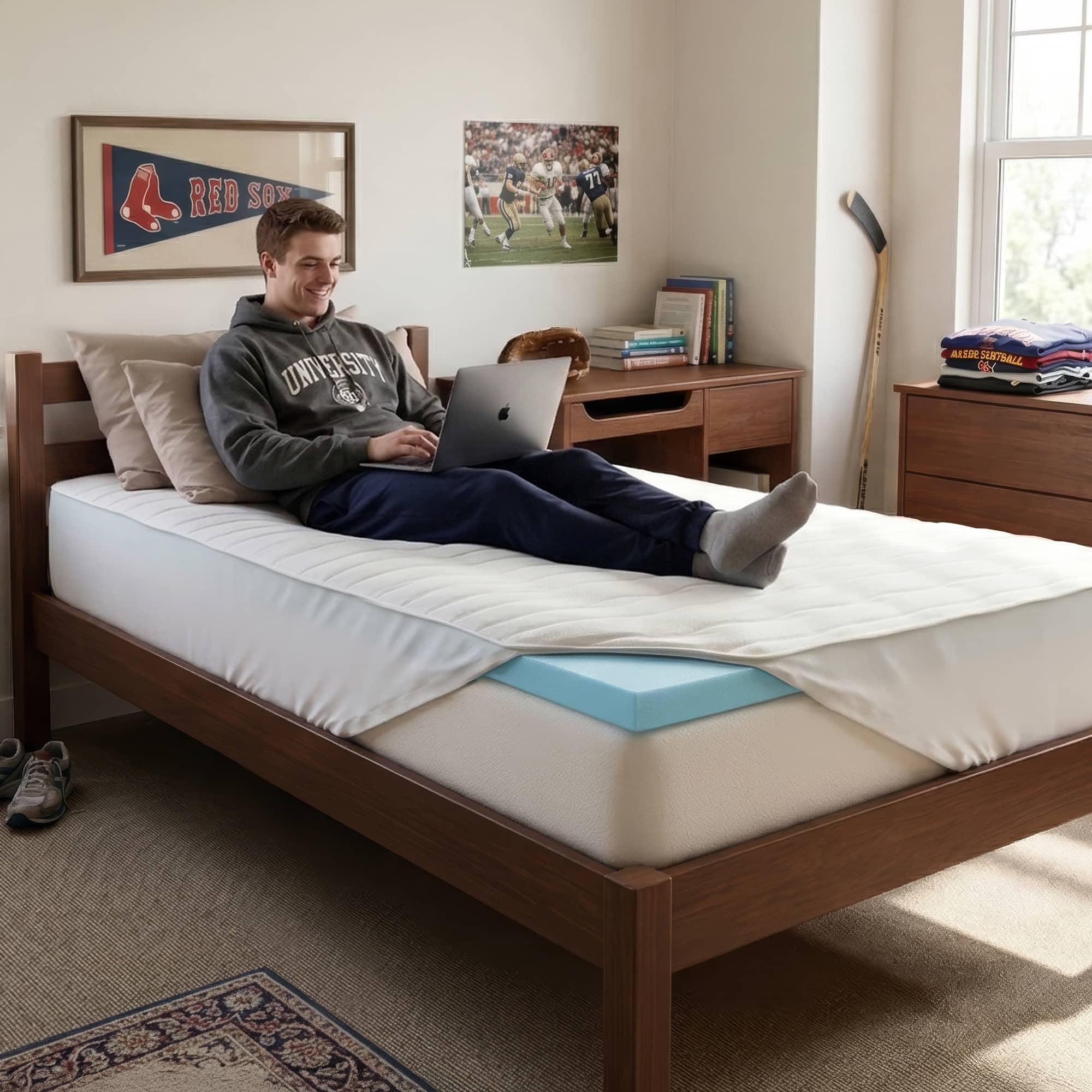 Orders placed by 2pm ships sam day. Responsive support.  Photo of a light blue mattress topper with a white lightly padded cover on top of a bed.