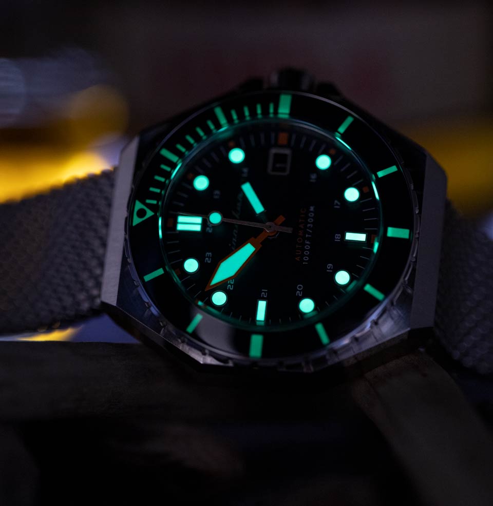 Dumas Lume on dial and hands