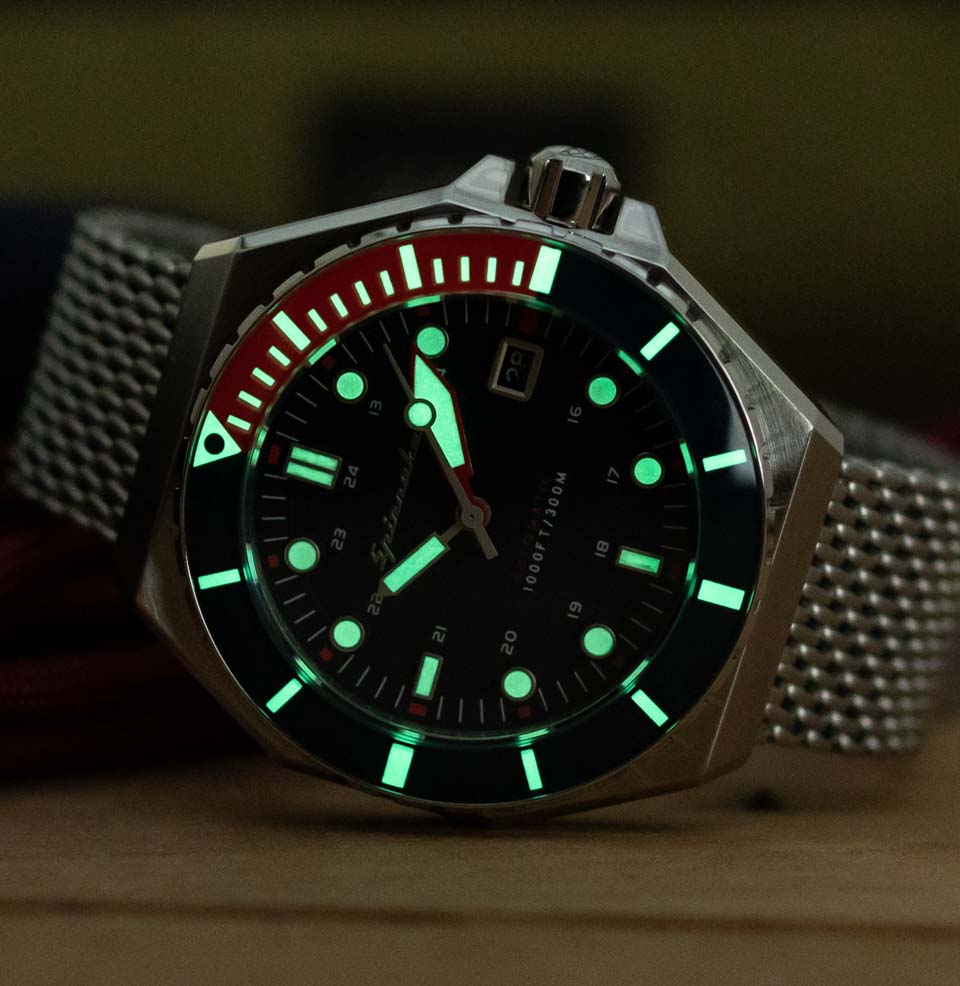 Dumas Lume on bezel, dial, and hands