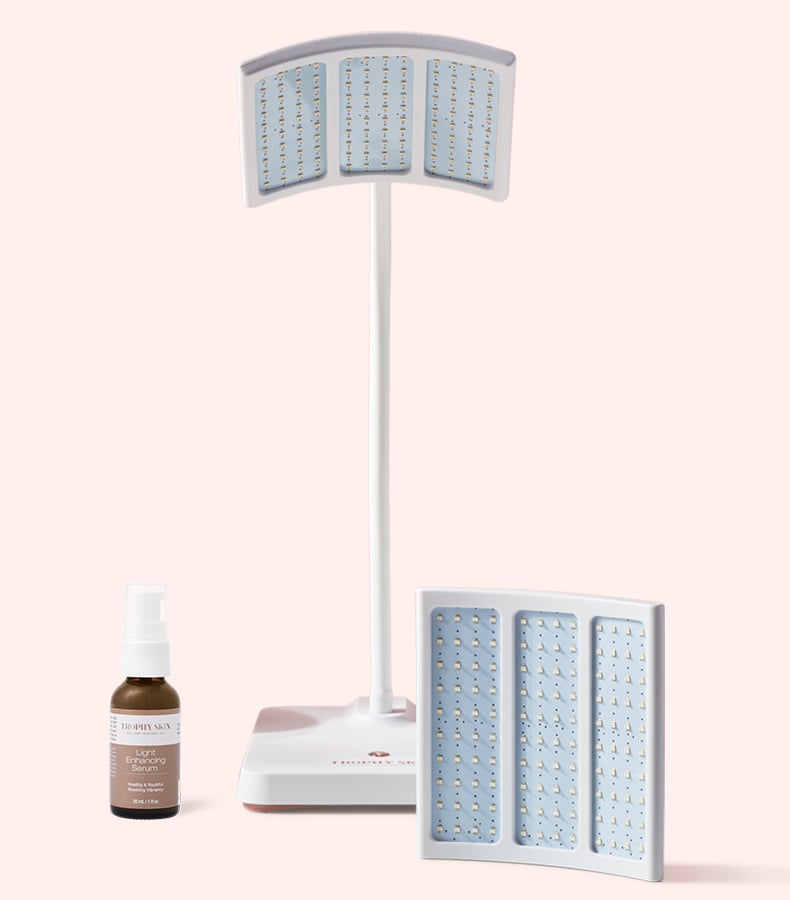 Light Therapy Duo: RejuvaliteMD, Blue MD Acne Light, and Light Enhancing Serum on Pink Background