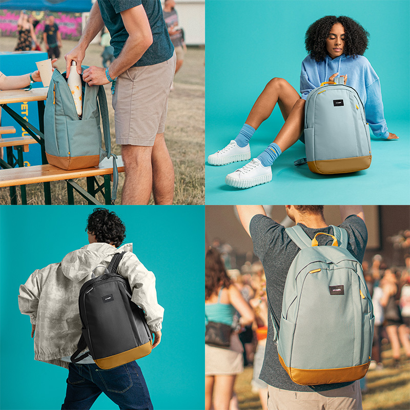 Model carrying bag with top handle. TurnNLock security hook. Model carrying the bag on one shoulder.
