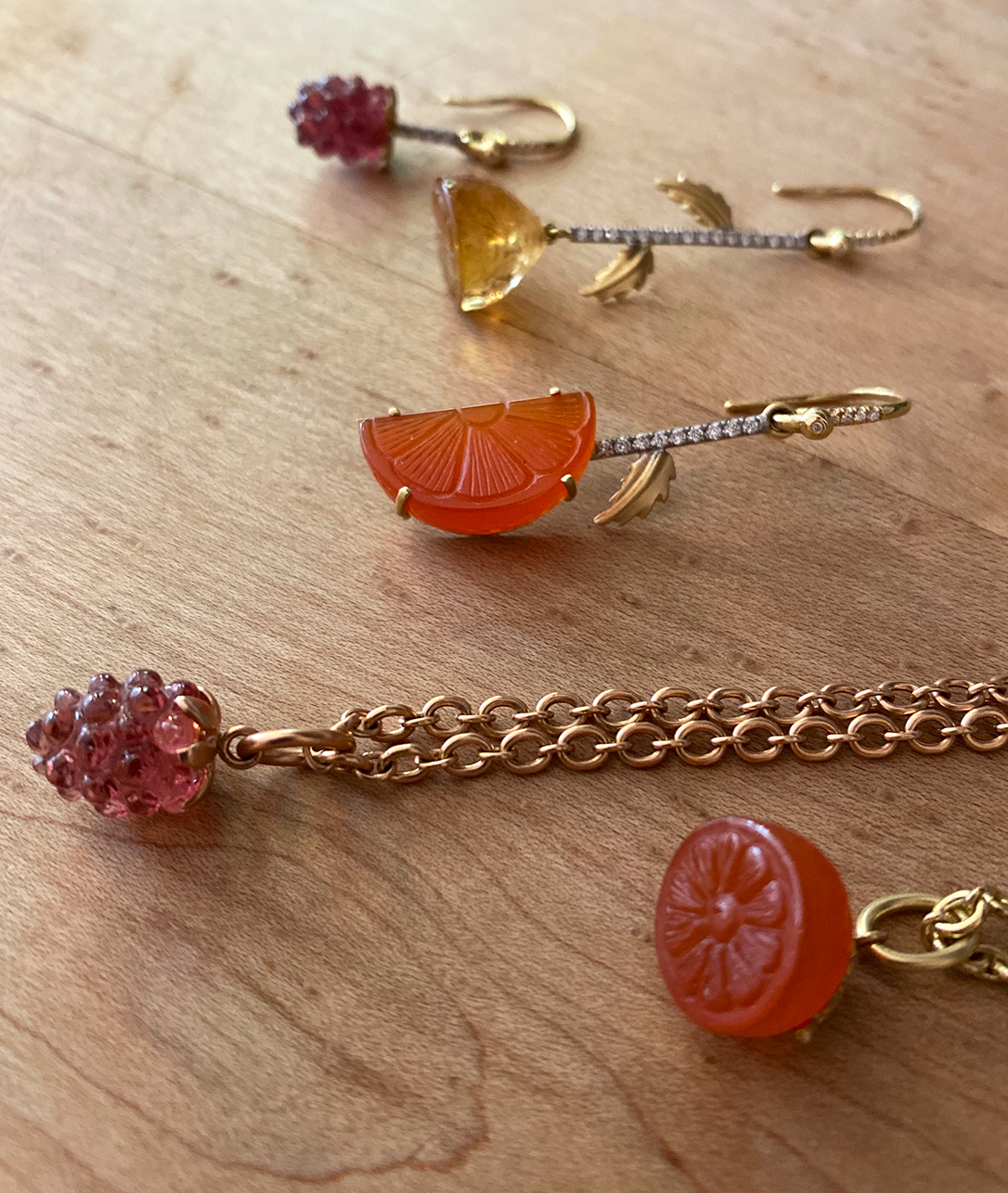 Fresh picked from the fruit stand, we like our carnelian clementines paired with bold Single earrings. 
