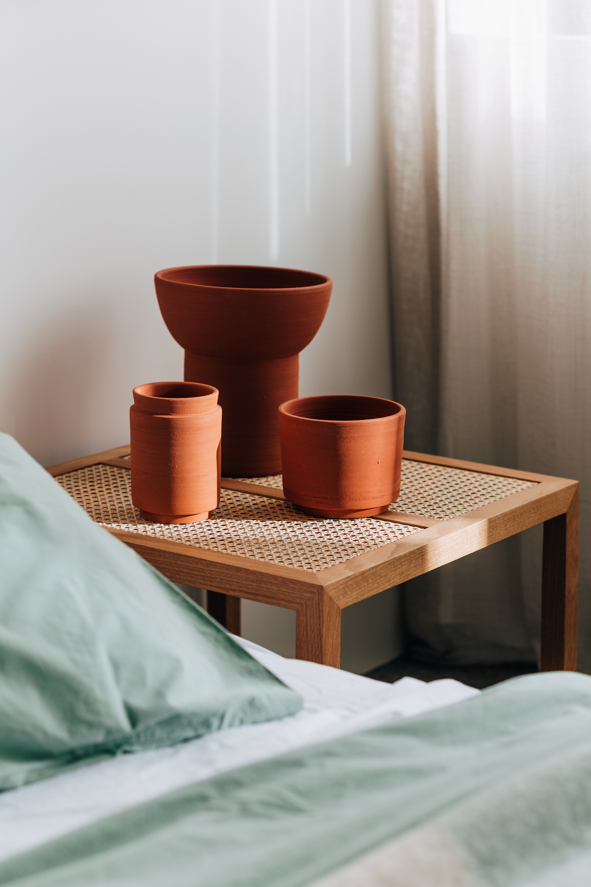 Vessel 010, 013 & 033 in Terracotta, Billie Side Table + Stonewash Eucalyptus Bed Linen