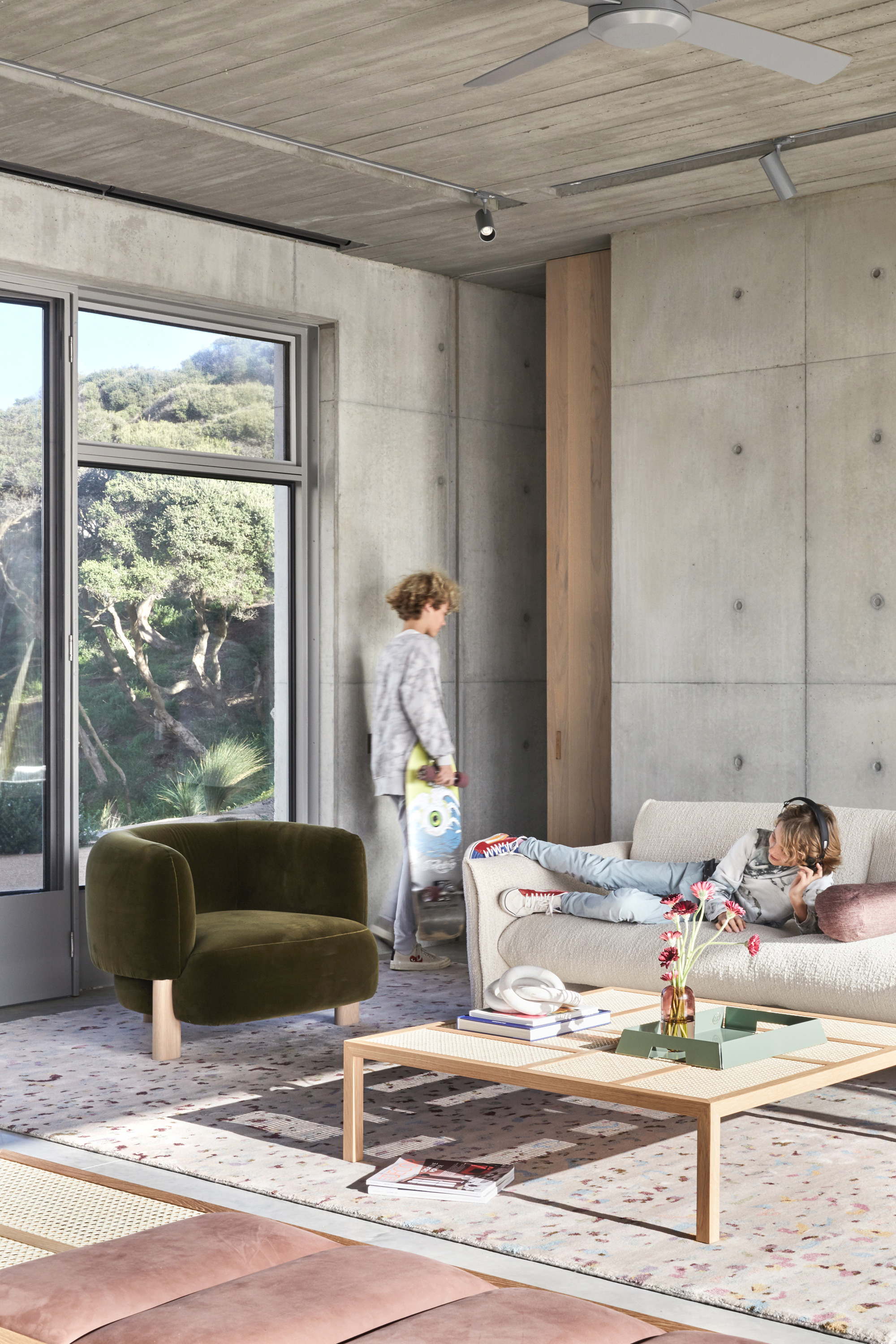 Lola Armchair, Leeroy Sofa, Billie Coffee Table, Leo Rug in Ash + Sugarpill in Aubergine