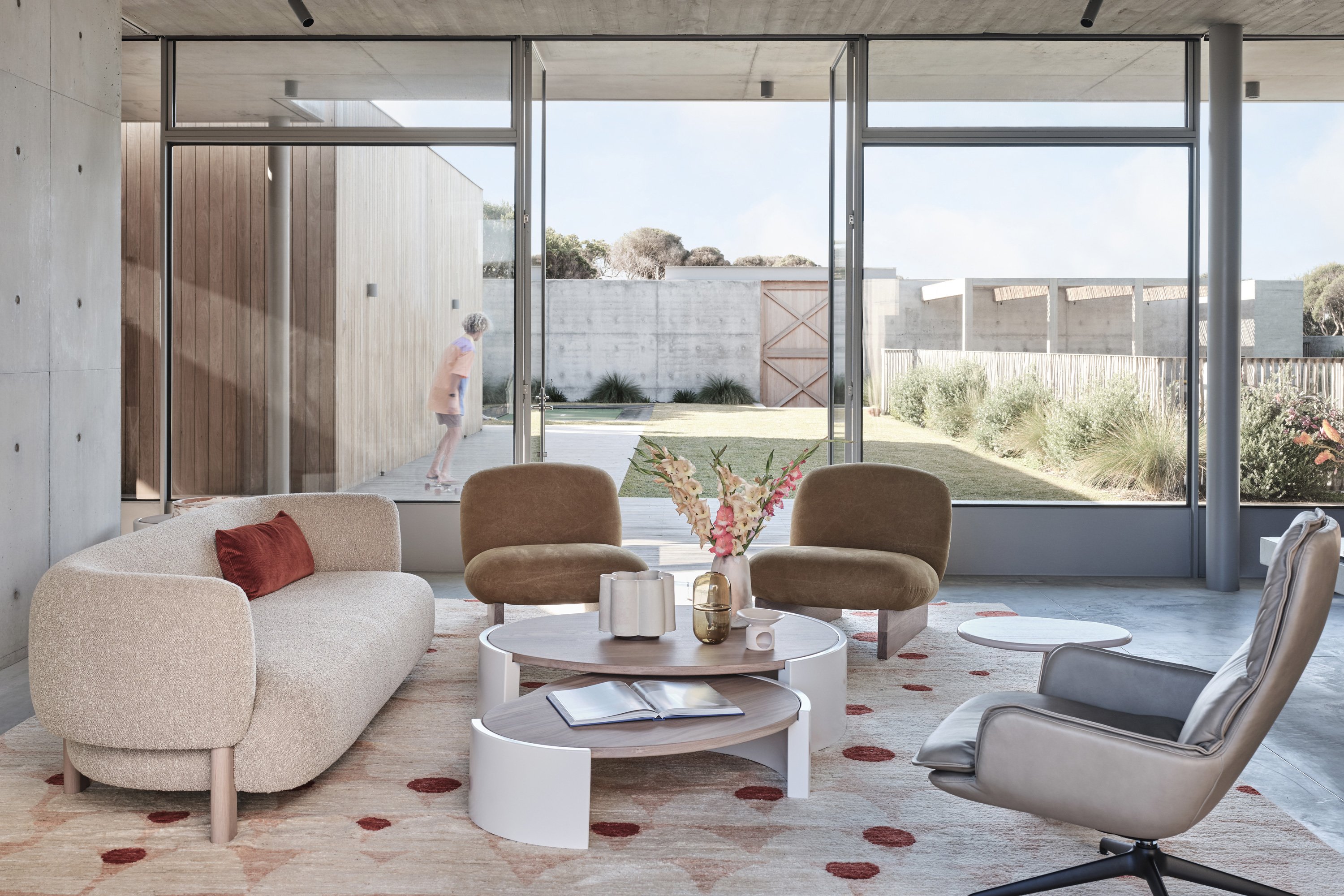 Lola Sofa, Ziggy Armchair, Frida Coffee Tables, Pepper Side Table, Banjo Armchair, Stevie Rug in Peach, Wide Scallop Vase, Sugarpill in Sargasso + Large Pebble Vase