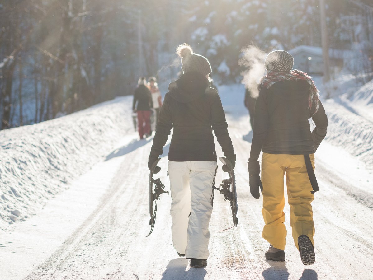 People walking in the snow outside