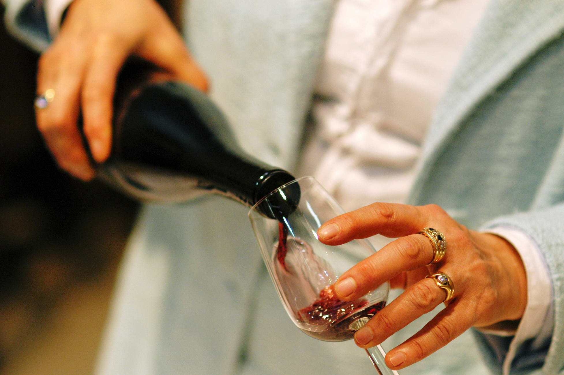 Pouring Red Wine Into Glass